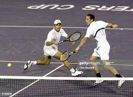 Fabrice Santoro and Michael Llodra, Llodra reached his first Grand Slam final, the Australian Open men's doubles, with Fabrice Santoro.