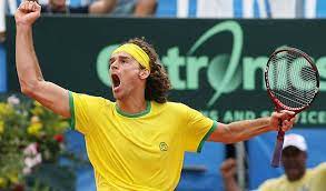 Gustavo Kuerten, a Brazilian retired world No. 1 tennis player. He won the French Open singles title three times,