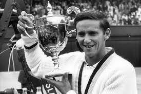 Roy Emerson, an Australian former tennis player who won 12 Grand Slam singles titles and 16 Grand Slam doubles titles, for a total of 28 Grand Slam titles.