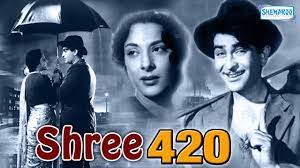 Shree 420, Raj falls prey to an unethical lifestyle when a rich businessman, Sonachand, lures him into it.