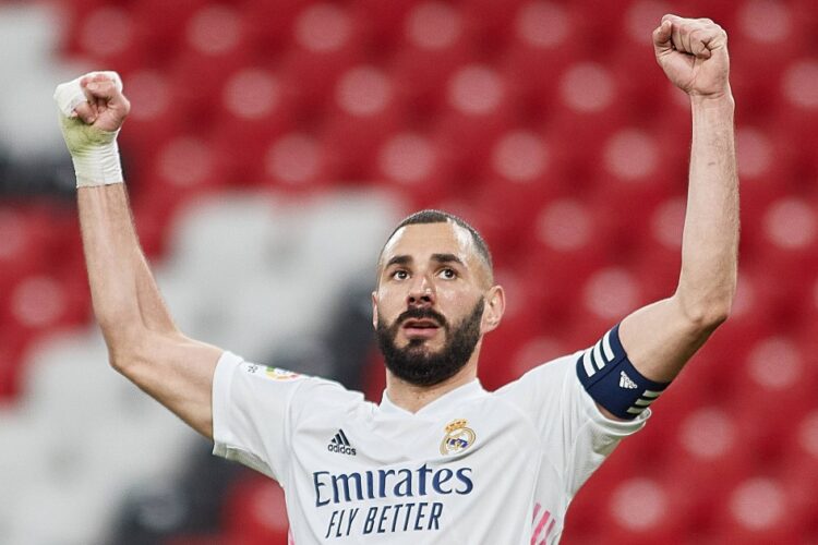 Karim Benzema, a French professional footballer who plays as a striker for Spanish club Real Madrid and the France national team.