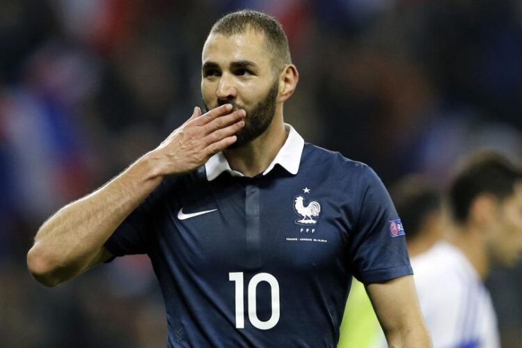 Karim Benzema, a French professional footballer who plays as a striker for Spanish club Real Madrid and the France national team.